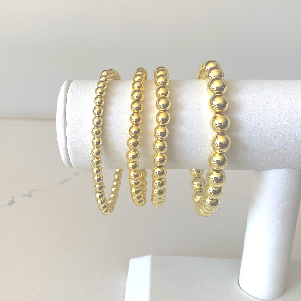 14k gold filled ball bracelet. Stretch, adjustable. Fits approx 7.5 inches